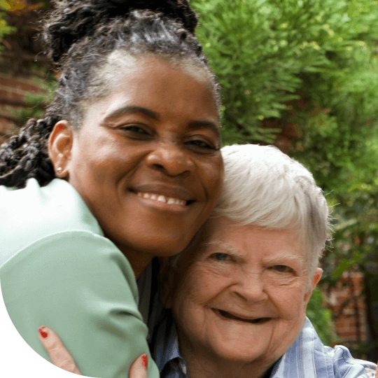 Two people smiling